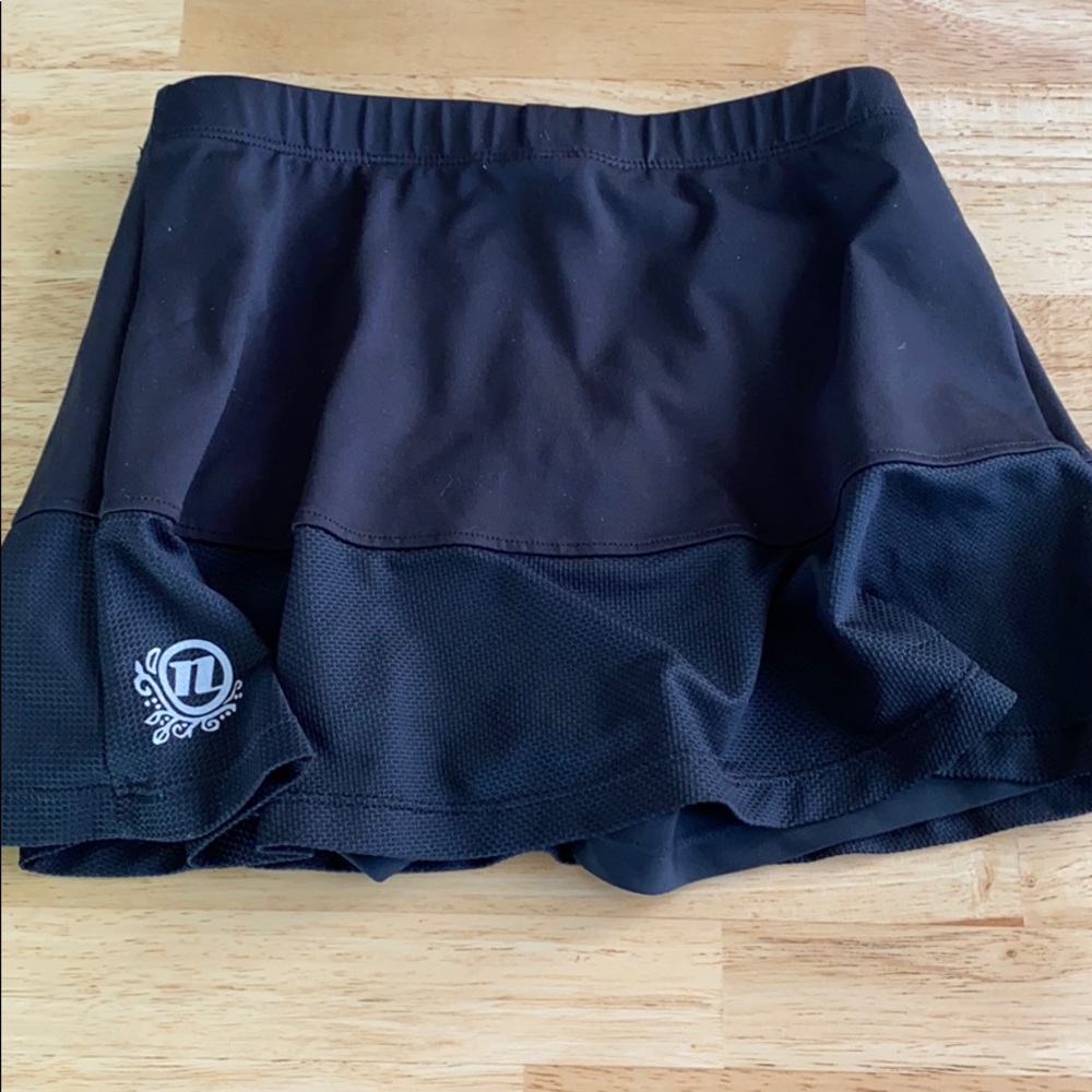 2 Girls (Twins) REI Novara bike/bicycling skirts.